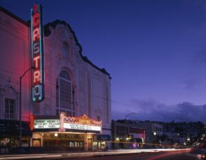 The historic Castro Theatre neon marquee and street lights at night in San Francisco’s Castro District.