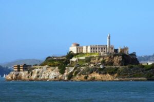 Alcatraz Island and the former federal prison building viewed from the San Francisco Bay.