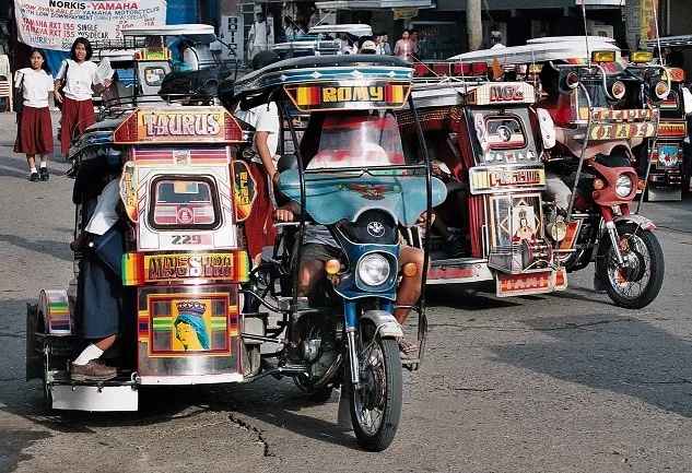 trycyle pedicab in Philippines Trycyle pedicabs in Philippines photo by: http://ffemagazine.com/filipino-icon-tricycle-pedicab/