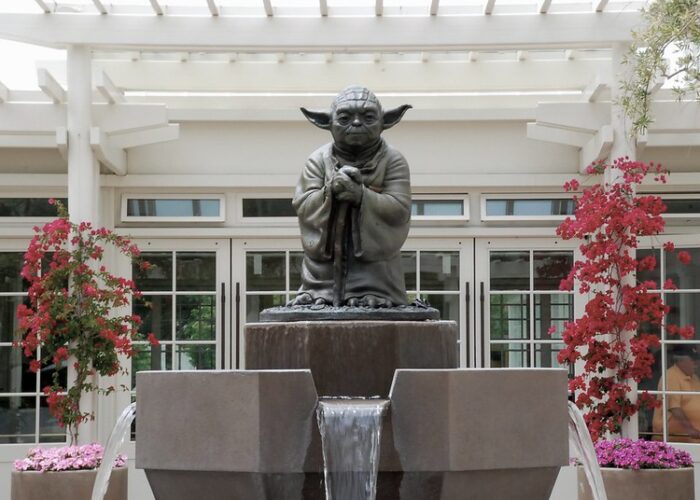 CC BY-NC 2.0 DEED Emmet Connolly. Yoda Fountain At the entrance to Lucas Arts and Industrial Light and Magic in the Presidio in San Francisco.